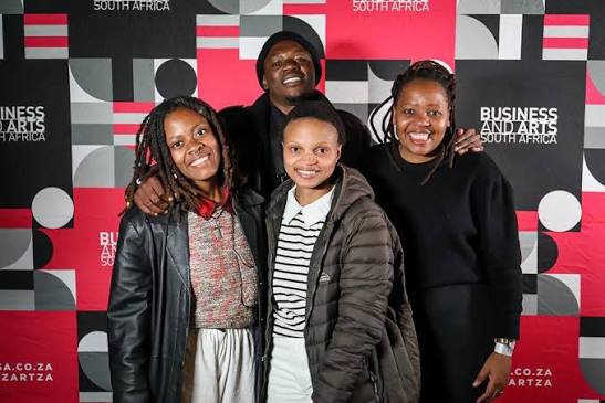 Leigh Zanah accepting 1st place at the SoCreative Summit 2022, a Business and Arts South Africa recognition
